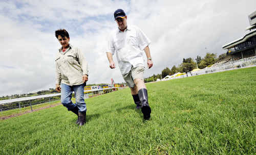 Heavy going: Lismore Turf Club curator Lesleigh Lisha and Chief Steward Craig Pringle inspect the Lismore Turf Club track yesterday – if there is no overnight rain the meeting will go ahead. Heavy going: Lismore Turf Club curator Lesleigh Lisha and Chief Steward Craig Pringle inspect the Lismore Turf Club track yesterday – if there is no overnight rain the meeting will go ahead.